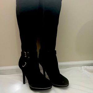 Sexy Black tall boots Size 8.